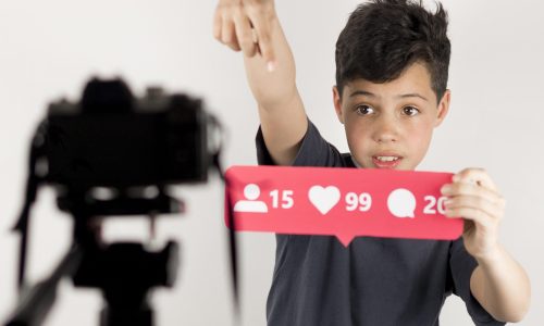 medium-shot-blogger-with-camera